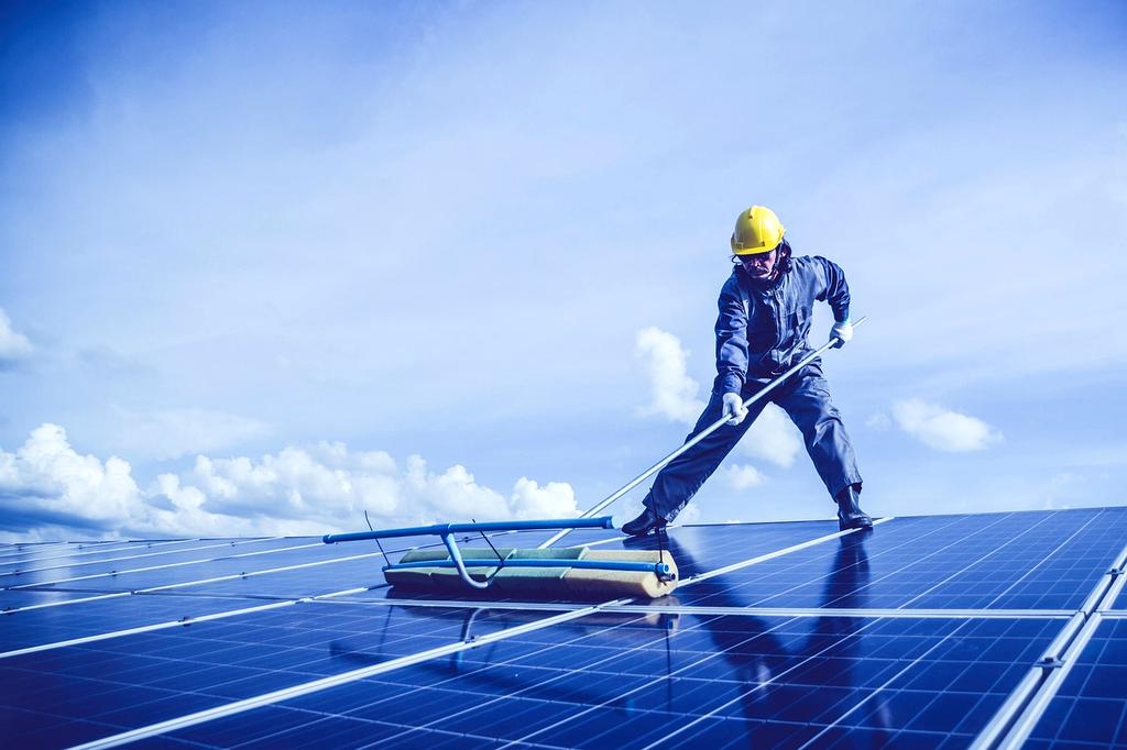 Robotic maintenance of solar panels